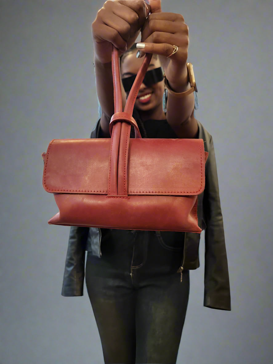 Red Leather One-Strap Handheld Clutch Bag – Bold, Compact, and Functional